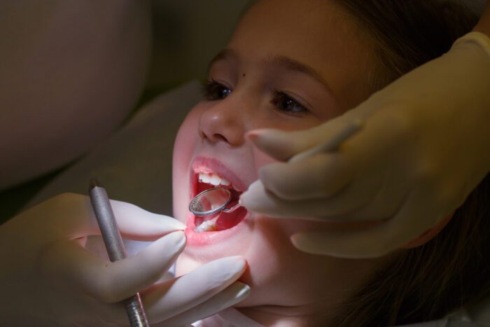 One of the key components of pediatric dental care is routine professional dental cleanings, ideally at least twice a year.